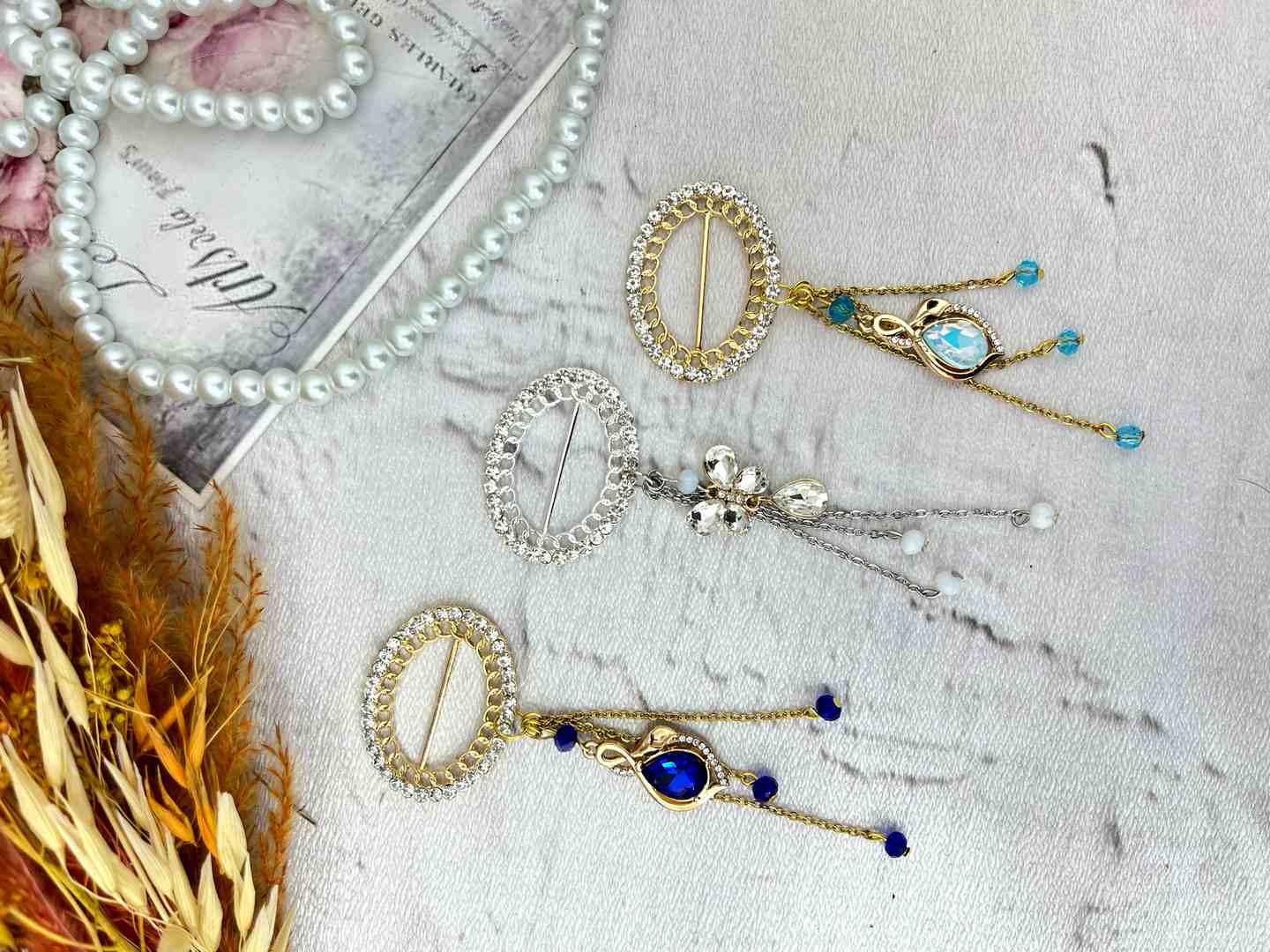 تصویر 1 از فروش عمده حلقه روسری آویزدار؛ انتخابی شیک، کاربردی و پرفروش